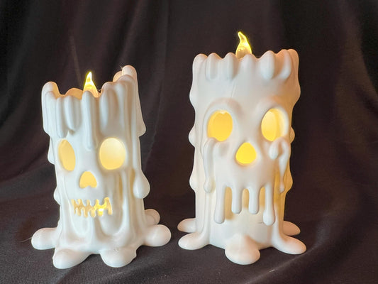 Halloween Skull Candle Pair: Gothic Melting Wax LED Decor