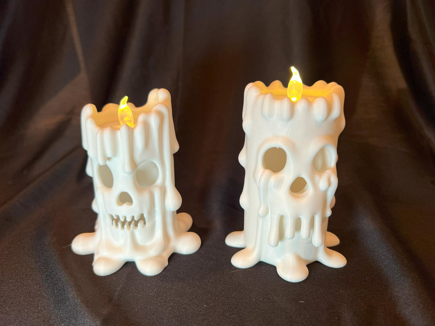 Halloween Skull Candle Pair: Gothic Melting Wax LED Decor