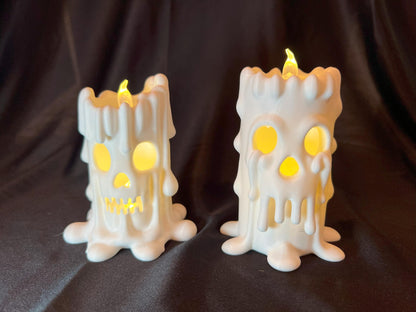 Halloween Skull Candle Pair: Gothic Melting Wax LED Decor